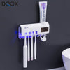 DENTICLEAN-TOOTHPASTE DISPENSER AND TOOTHBRUSH STERILIZER